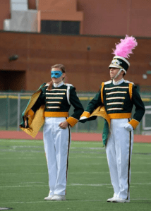 Seniors Kyle Timmons and Maggie Schulhoff lead the band during the MSBA finals on Nov. 7 in Norwood’s Shea Stadium. Timmons is the Drum Major/Field Commander, and Schulhoff is the leader of the band’s percussion section.